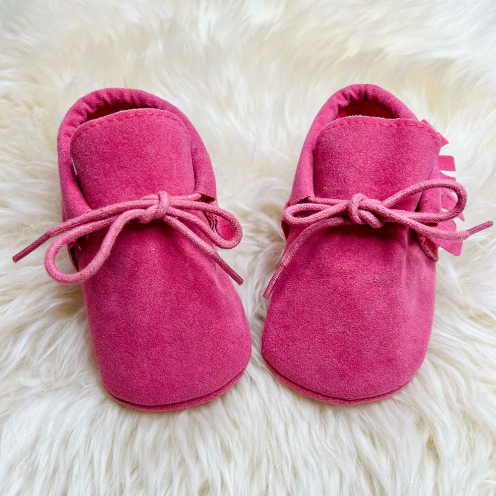 Brand new! Pink Moccasins. Toddler size 3.